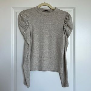 Beige sweater with pearls
